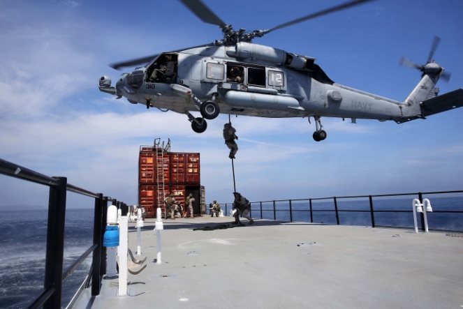 Marine special operations units MARSOC train in fast roping onto ships to - photo 6