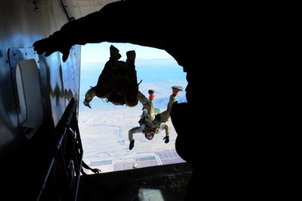 Seventh Special Forces Group Airborne Green Berets exit the back of a SKYVAN - photo 9