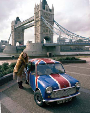 A Mini Mark III painted in patriotic Union Jack colours is pictured in front - photo 1