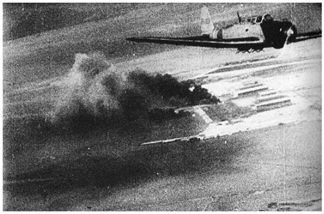 US battleships under air attack at Pearl Harbor as photographed by a - photo 3