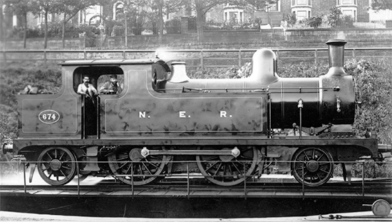 Polished to perfection North Eastern Railway Class A 2-4-2 No 674 standing - photo 3