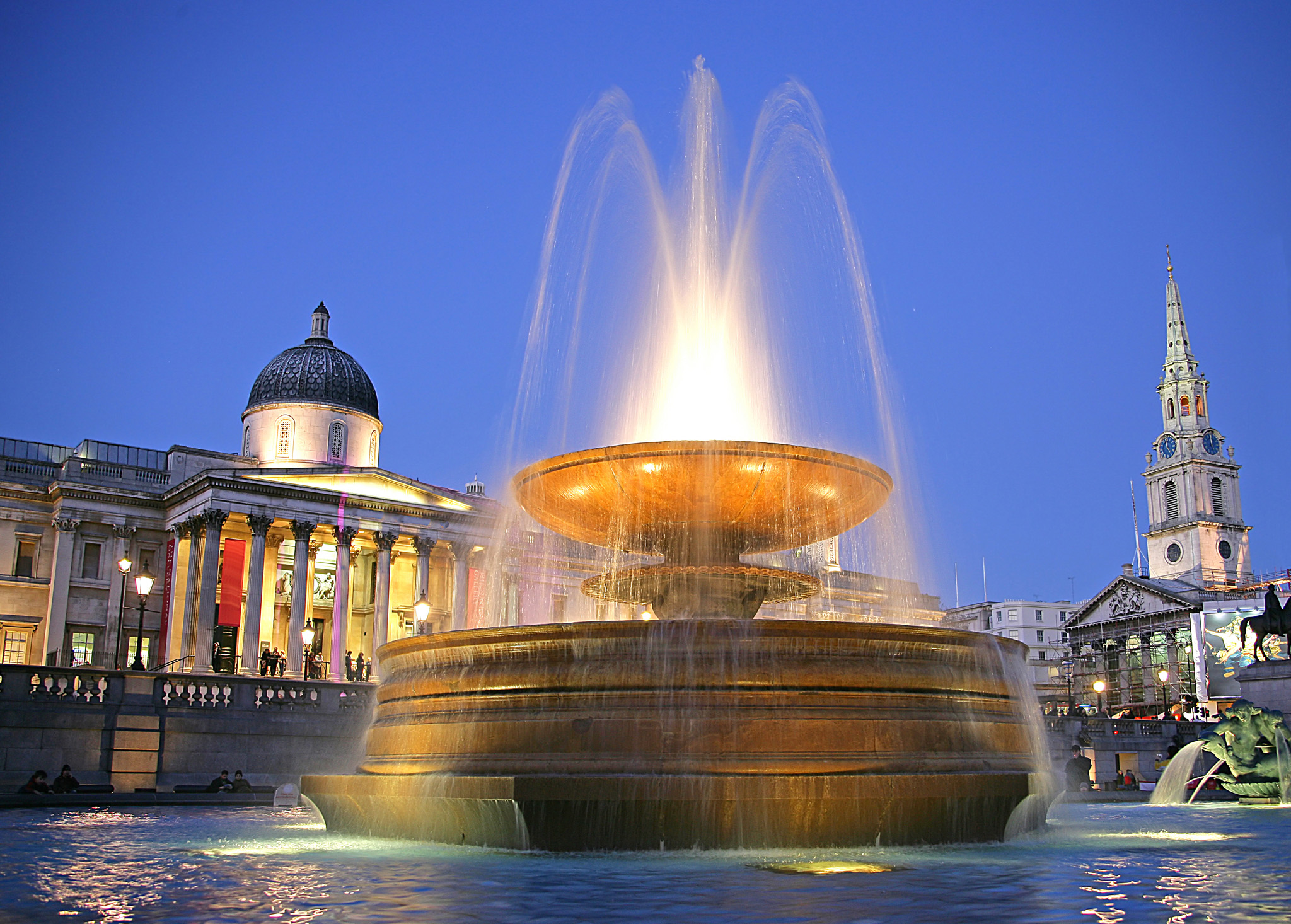 Trafalgar Square Londons central point is beautifully lit up at night - photo 5