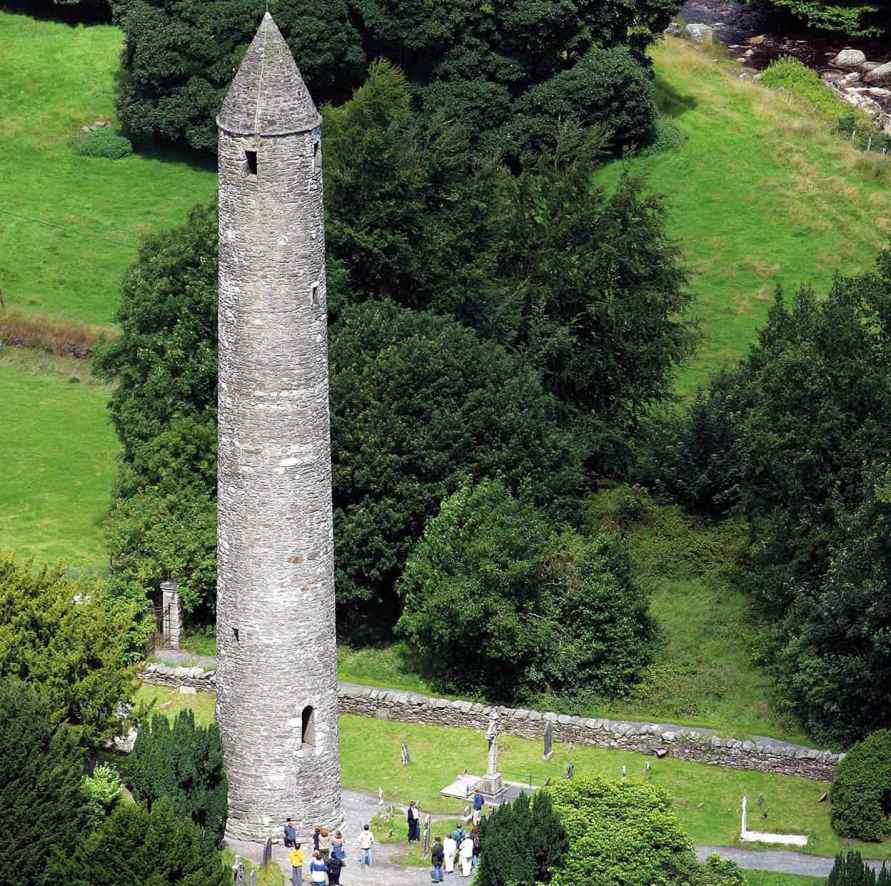 Glendalough Round towers are a striking reminder of Irelands Golden Age when - photo 6