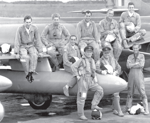 OC TacWing Wg Cdr John Jennings with left foot on his helmet standing - photo 3