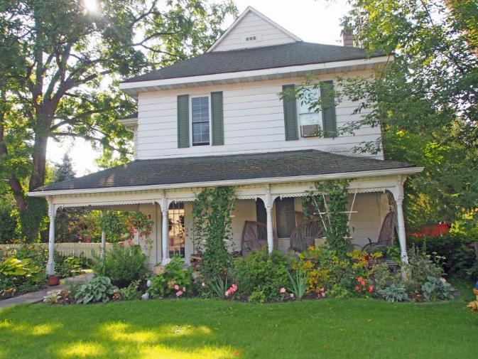 23 hipped roof with decorative pediment decorative veranda spindles and - photo 5