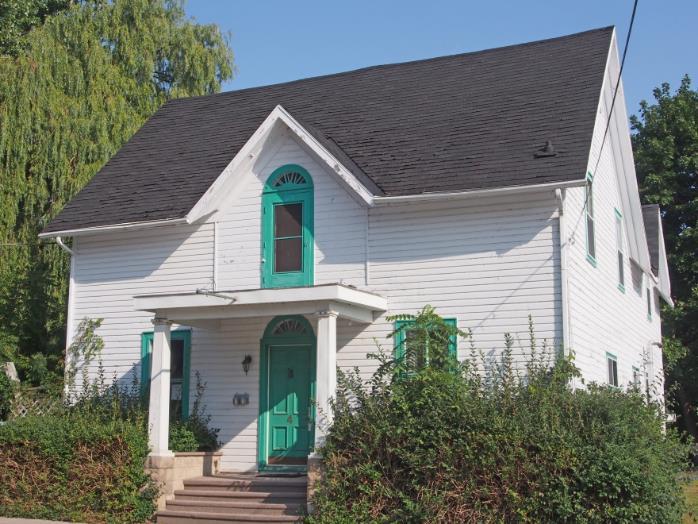 4 - Ontario Cottage style round-headed window in center gable 33 Main - photo 13