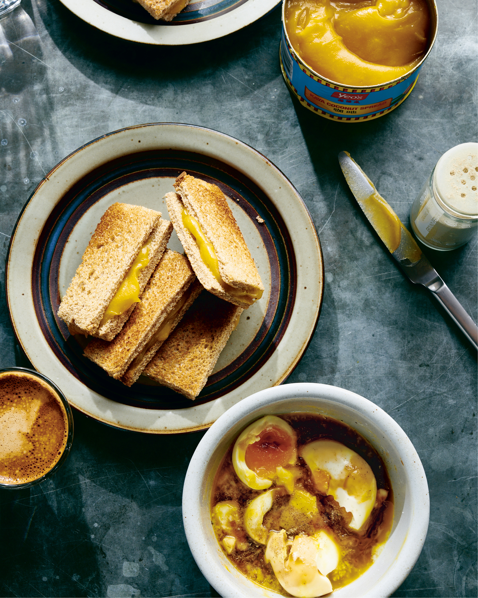 Kaya toast and eggs is a Singapore tradition toasted light-brown bread covered - photo 6