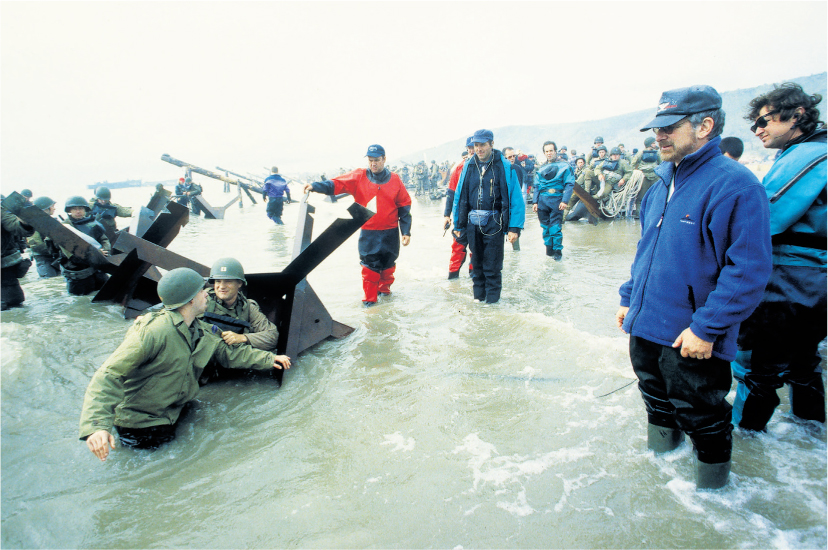 Steven Spielberg far right directing the Omaha Beach D-Day sequence in Saving - photo 16