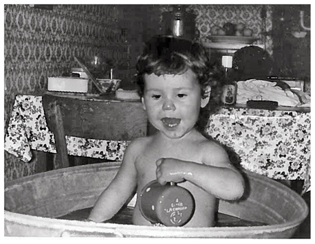 Taking a bath In a metal tub In the kitchen Life was so simple back then - photo 8