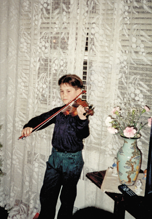 Celebrating my ninth birthday in our living room with me entertaining of - photo 22