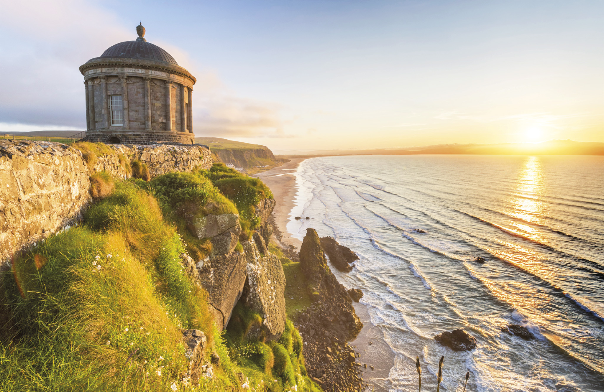 t Mussenden Temple at sunset perched on a cliff edge along Northern Irelands - photo 5