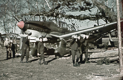 Early 1941 Armourers carrying 50kg SC50 bombs in front of a Junkers Ju 87 B-1 - photo 9