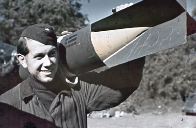 Early 1941 Armourers carrying 50kg SC50 bombs in front of a Junkers Ju 87 B-1 - photo 10