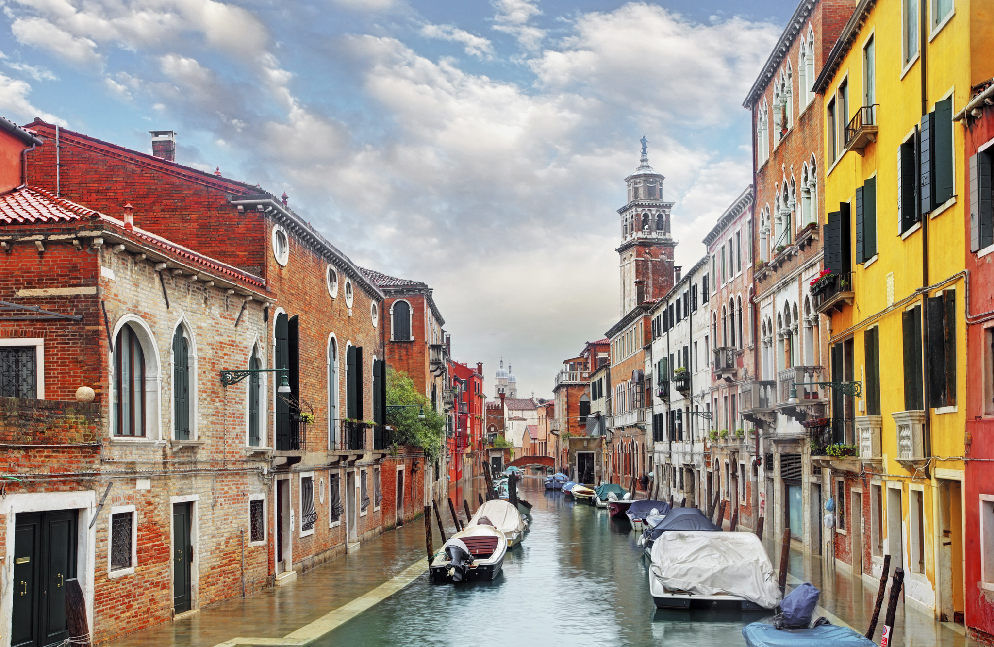 t A picturesque canal in Venice lined with boats Magnificent piazzas - photo 5