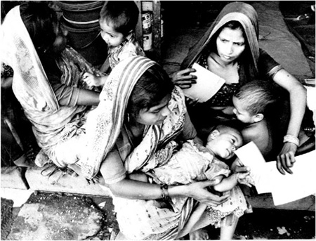 Mothers queue for hours to ensure that their babies are given essential - photo 13