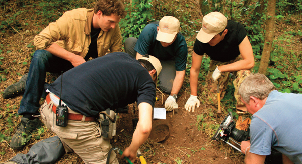 Careful archaeology reveals the fragile remains of a helmet belonging to one of - photo 8