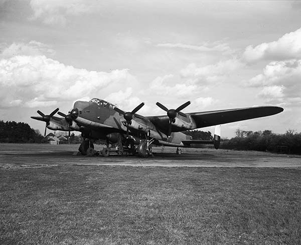 April 1945 A No 617 Squadron RAF Lancaster Mk I Special is bombed up with a - photo 11