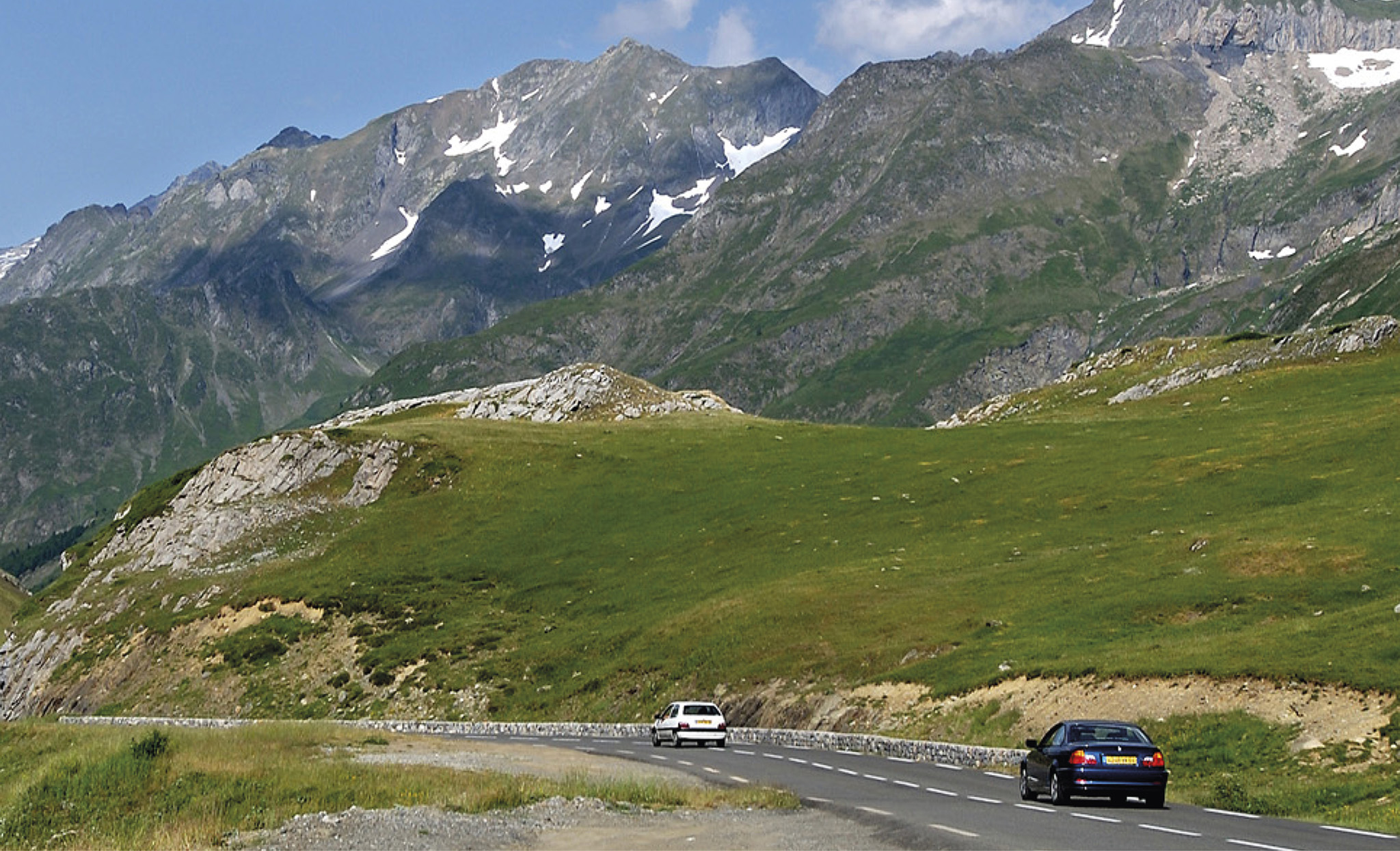 Cars passing by the peaks of the Pyrnan mountains g Introducing France - photo 3