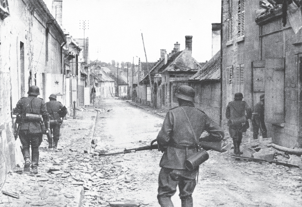 Infantry assembled in a captured town Prisoners file out of the fortified - photo 11