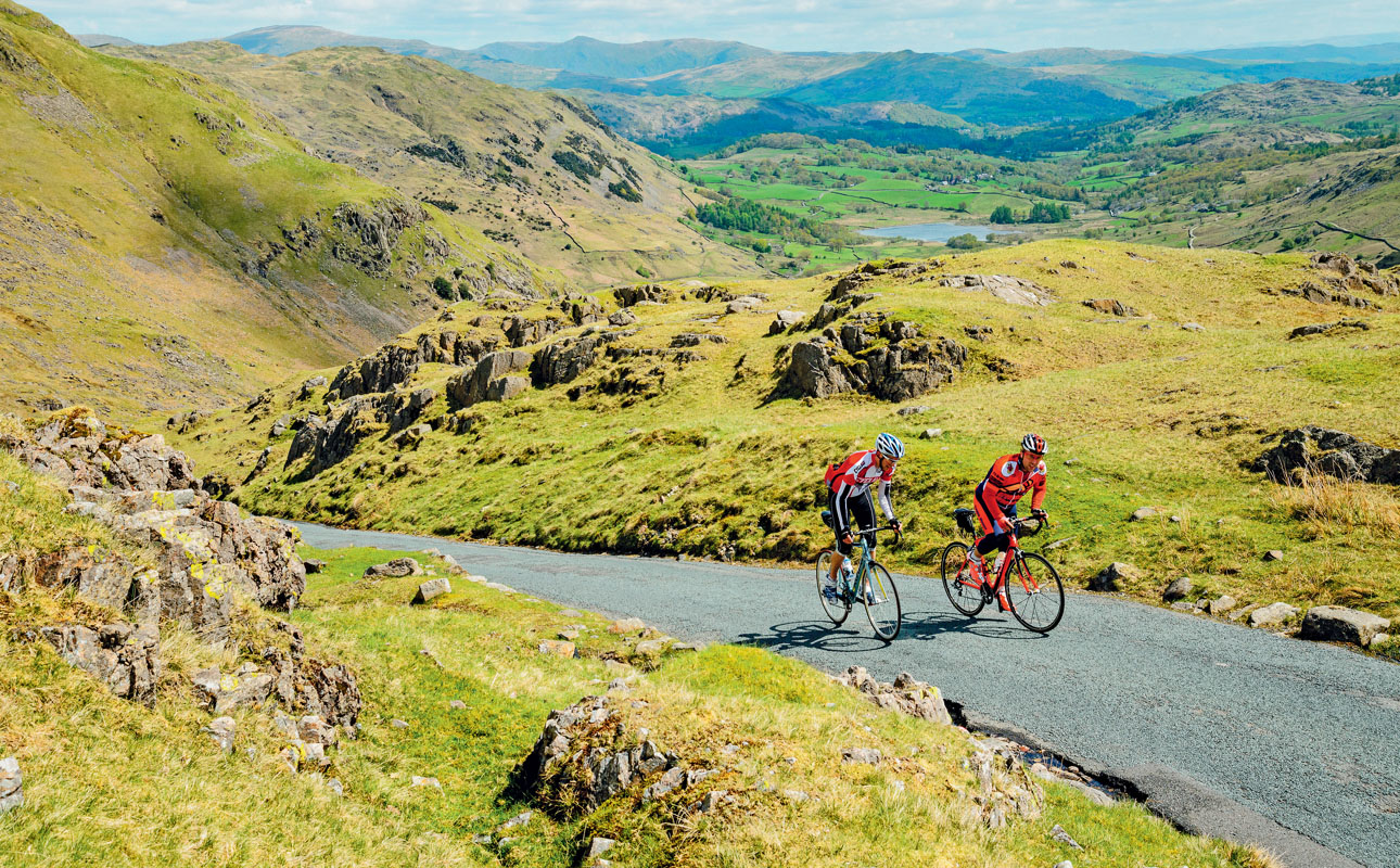 Two cyclists tackle the short but steep climb of the Wrynose Pass in Englands - photo 6