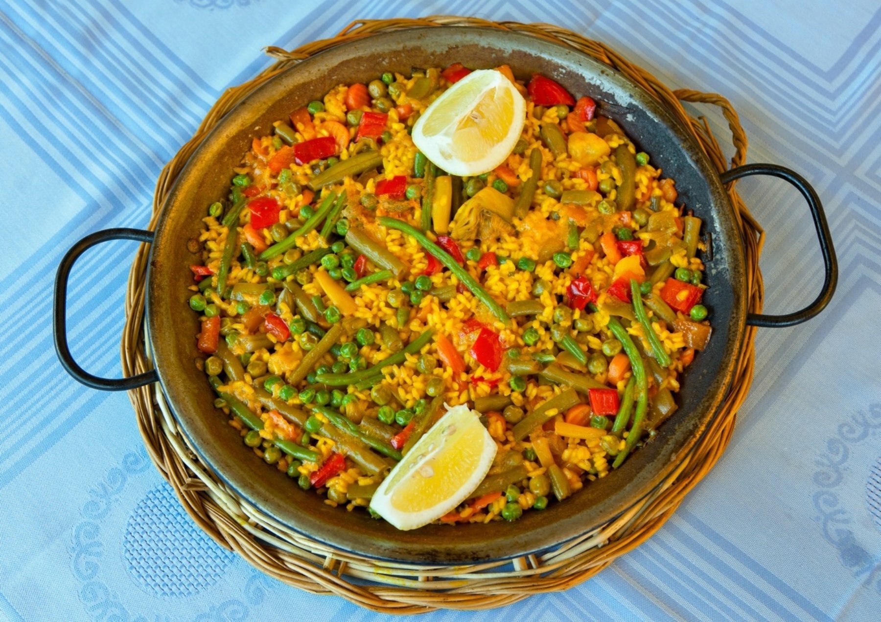 Description Our cooking experts have added tofu to this paella recipe to give - photo 9