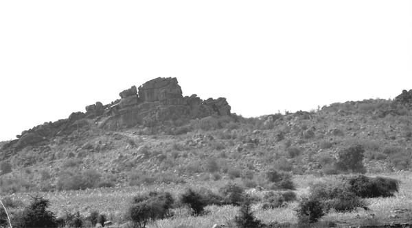 Fig Prelude 1 Erragudi rocks as they appear from the surrounding fieldsFig - photo 1