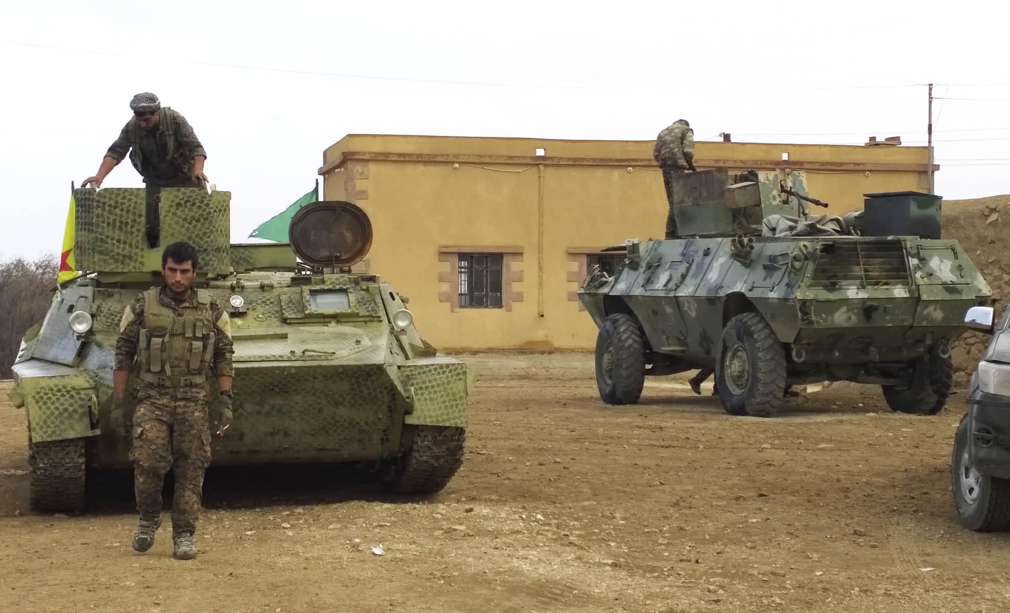 An interesting pair of vehicles in YPG service preparing for an operation - photo 4