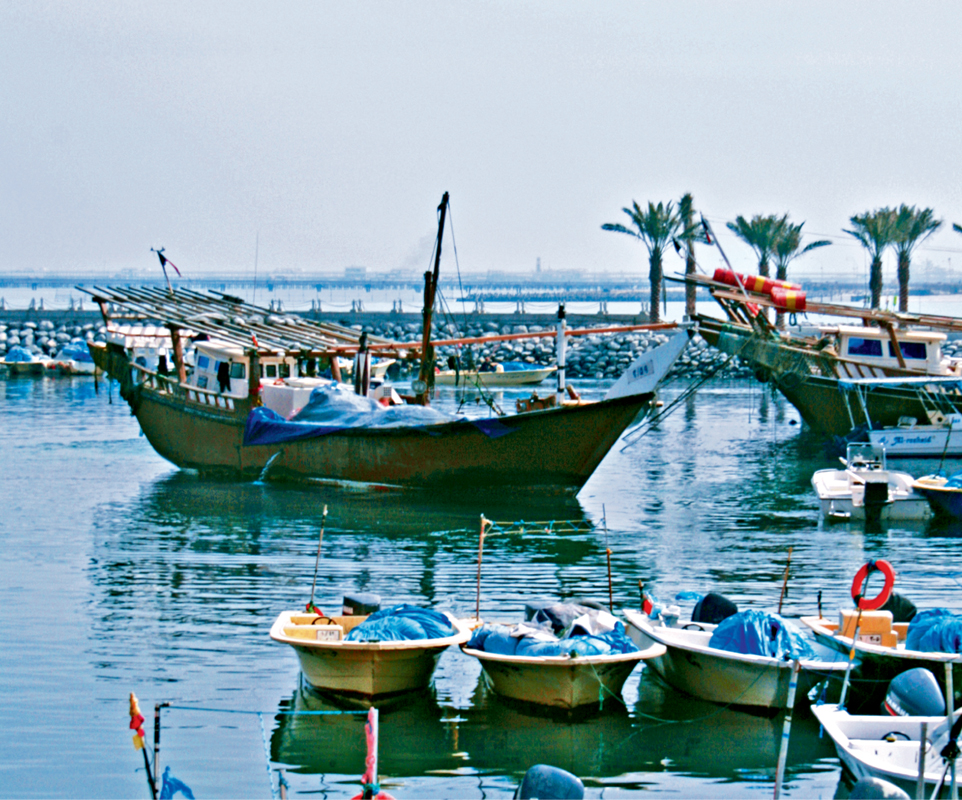 Old dhows and fishermen in Fahaheel Kuwait To understand food-sharing is to - photo 9