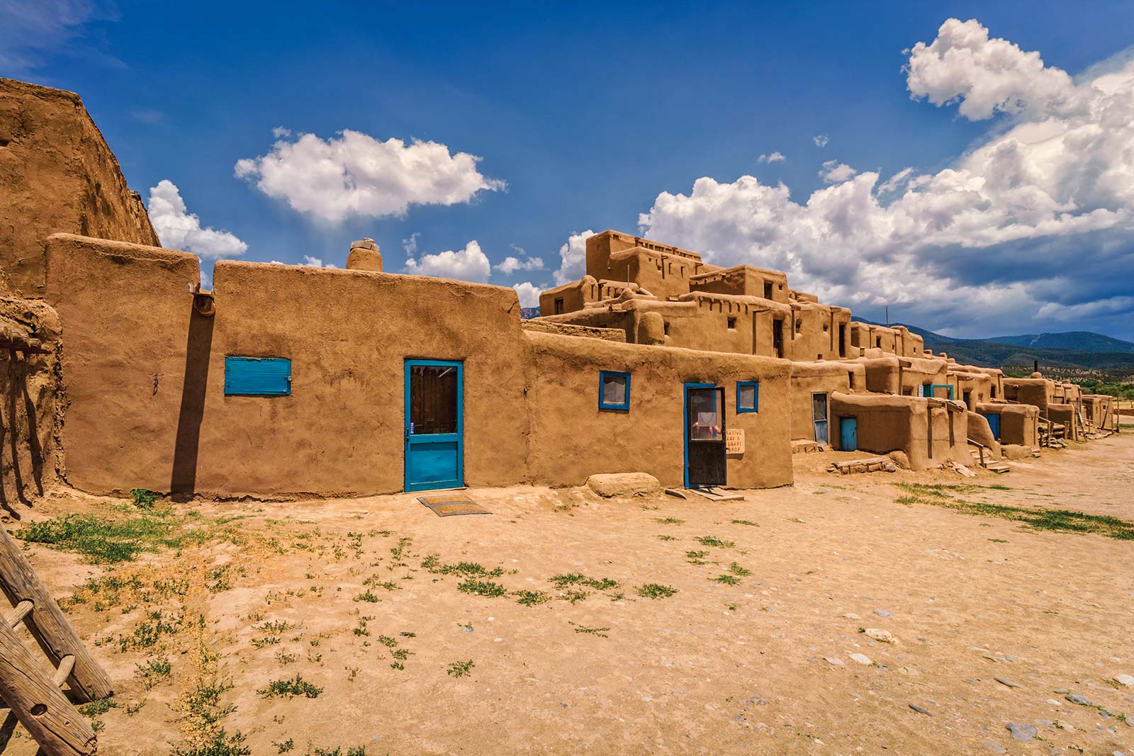 Seemingly rising organically from the earth these stepped adobe buildings - photo 15