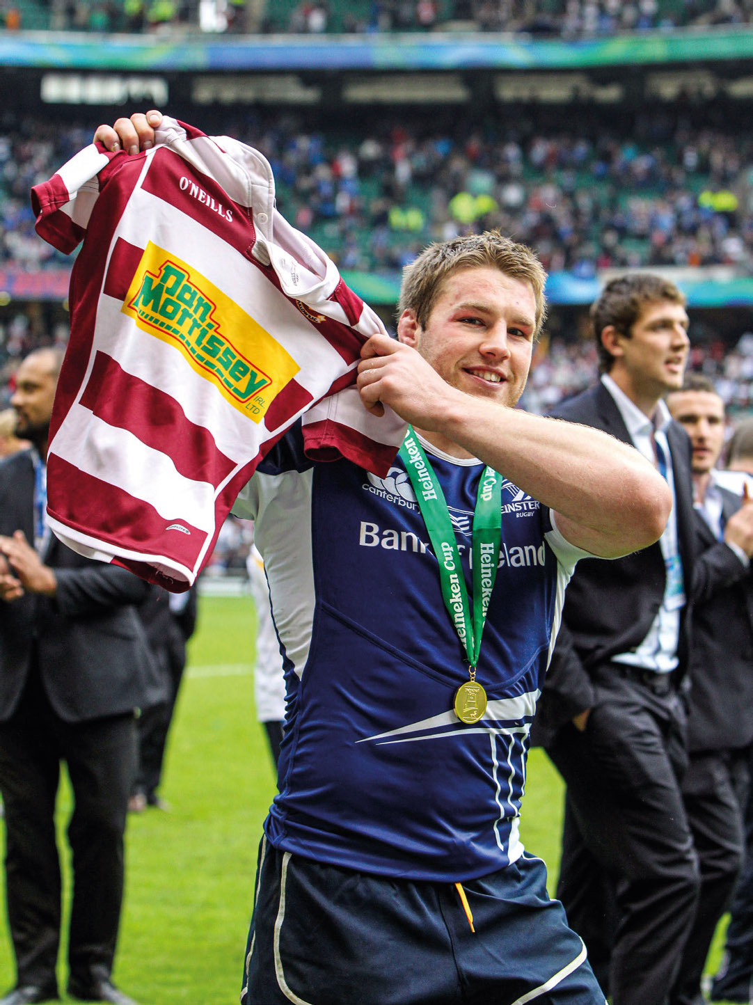 11 Holding up a Tullow jersey after the 2012 Heineken Cup final win against - photo 11