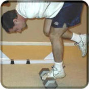 This exercise is done one leg at a time Set up with the balls of your foot - photo 3