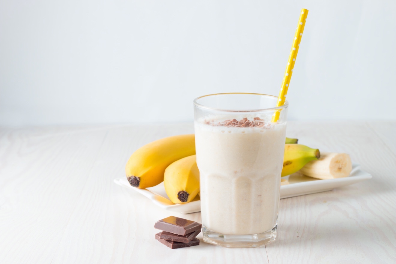 Jessica makes a protein shake for herself in the morning by scooping a big - photo 12