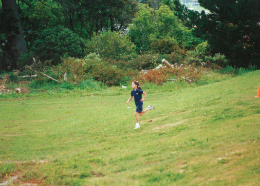 Competing in a school cross-country race at the age of eight Running was my - photo 4