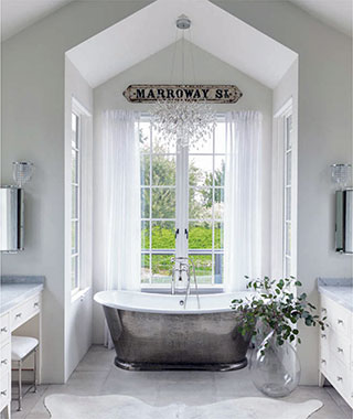 Nature and light frame an intimate alcove where whites and a silver soaking tub - photo 10