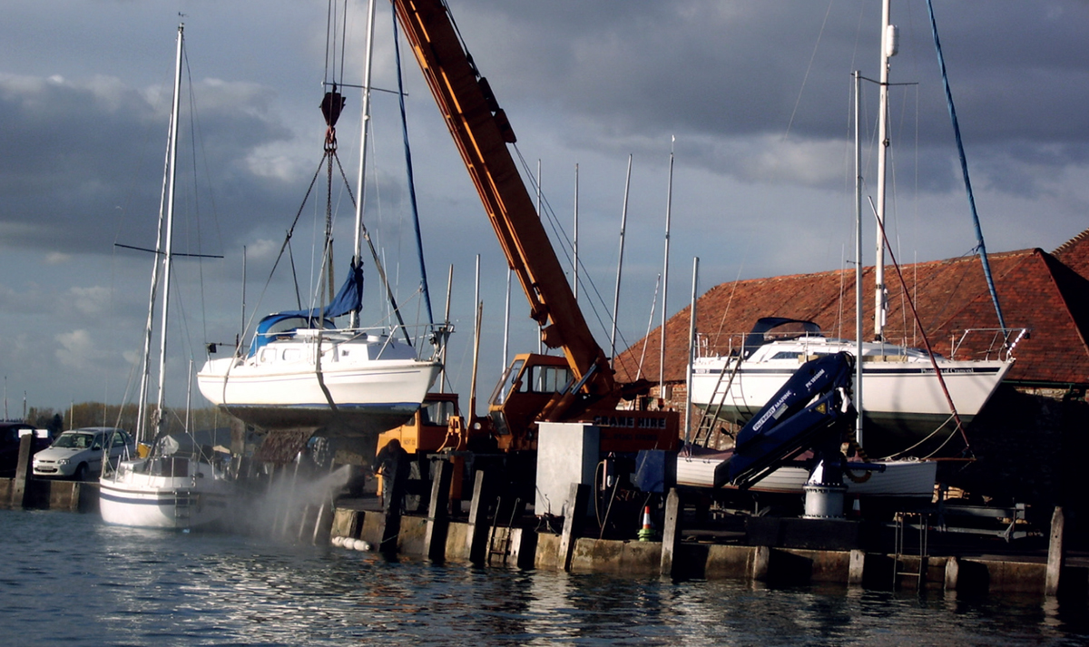 Yachts being lifted ashore at the end of the season The yacht in the slings is - photo 6