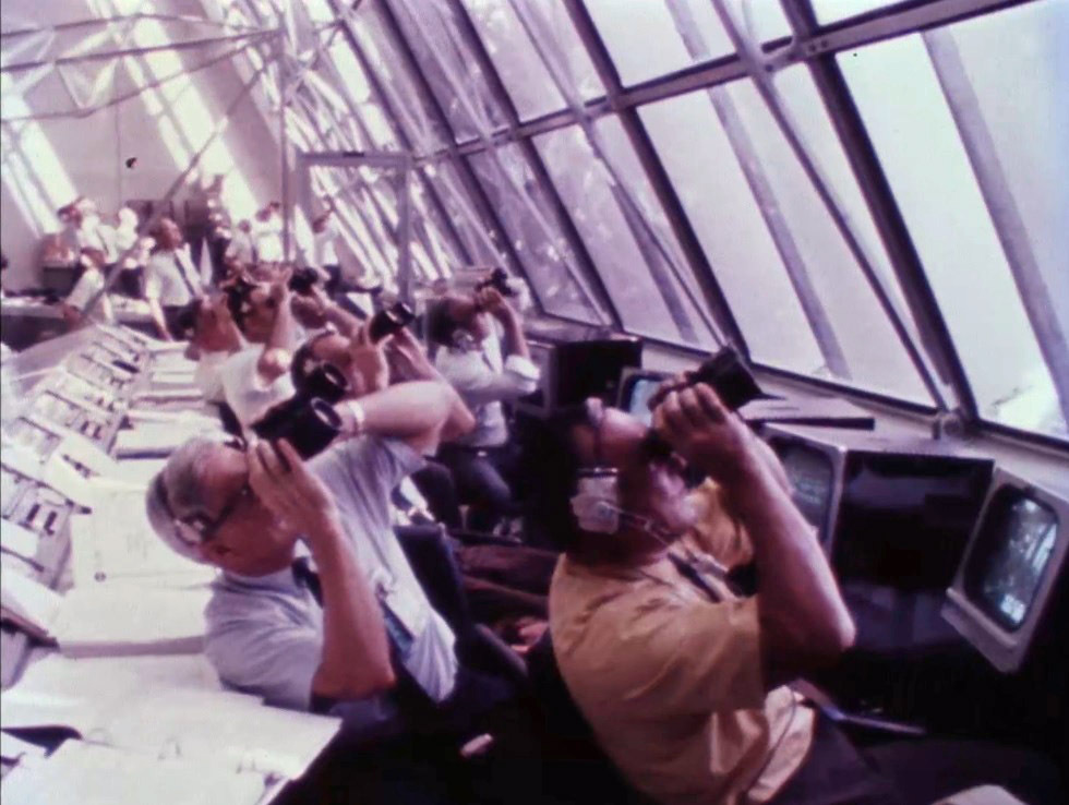 mission Control Center staff watch closely as the Saturn V SA-506 rocket - photo 12