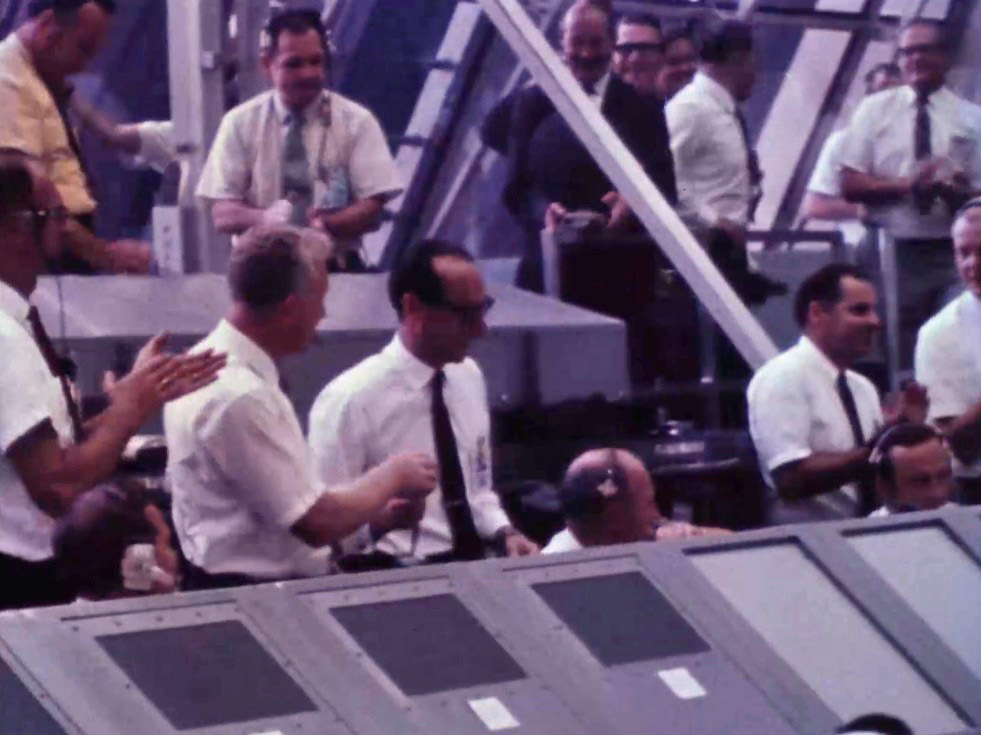 mission Control Center staff and visitors applaud a successful liftoff - photo 13