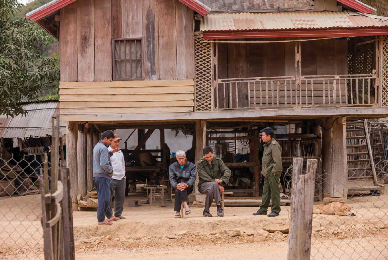 A traditional house in Xam Tai village provides a gathering place for - photo 6