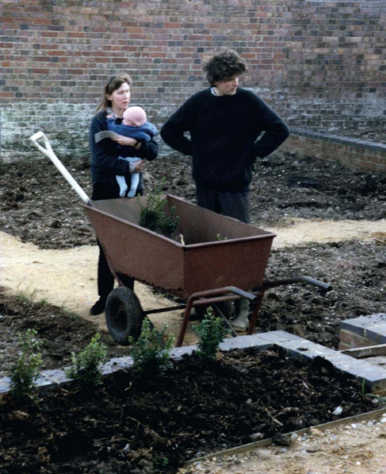 Sue and Tom with baby Rose planting the first hedges in the courtyard at the - photo 4