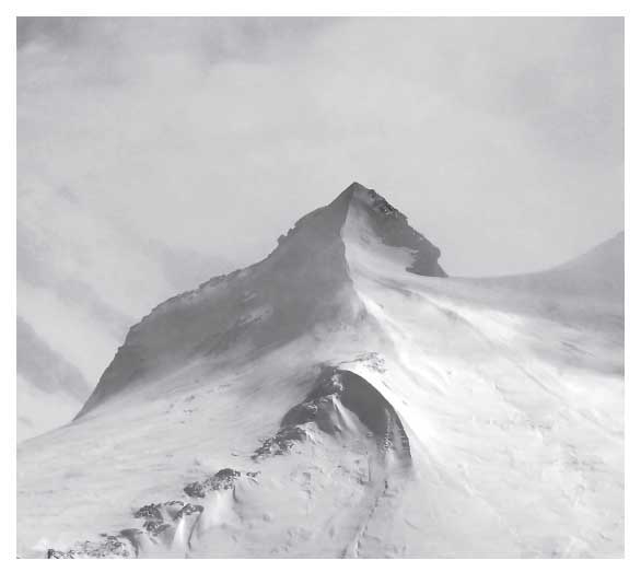 Archdeacons Tower a shark-finned snow ice and rock pinnacle climbs to 19537 - photo 2