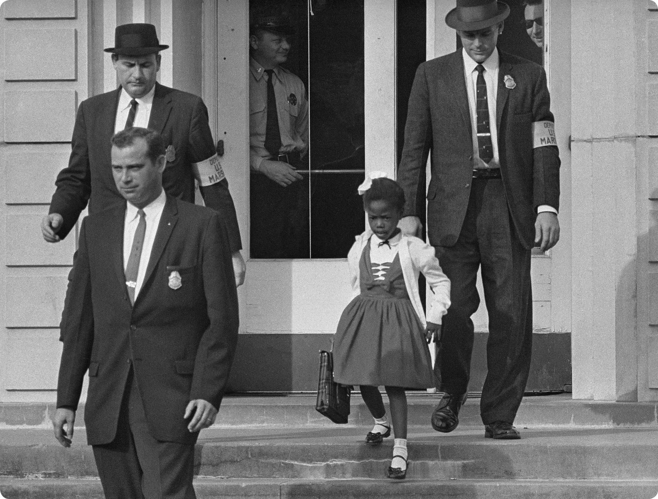 US marshals escort Ruby Bridges from William Frantz Elementary School in New - photo 6