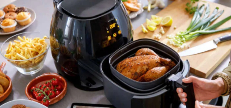 Air Fryer Basics An air fryer is a modern-day kitchen appliance that is the - photo 1