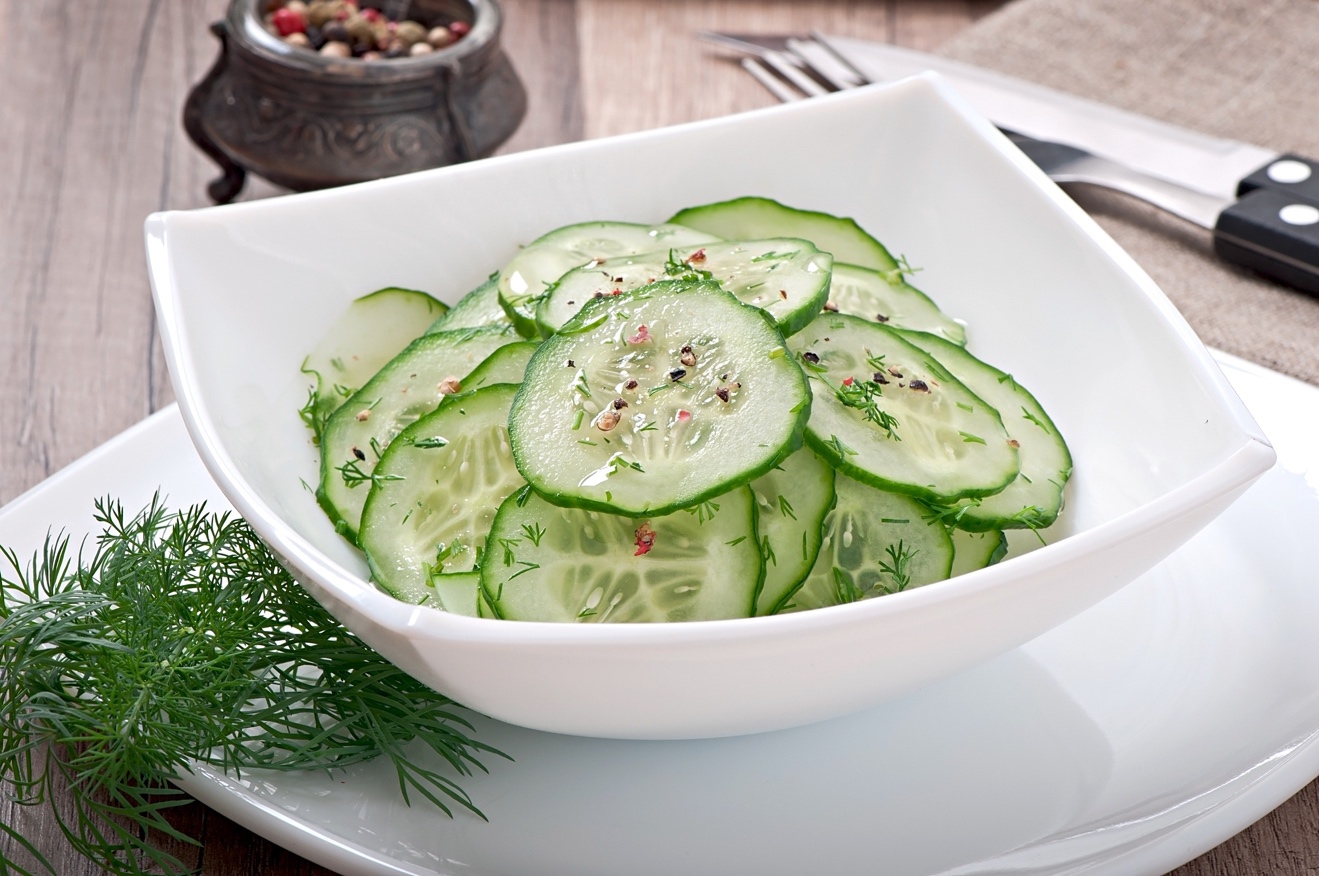 This Korean cucumber salad is made with cucumber green onion and sesame seeds - photo 6