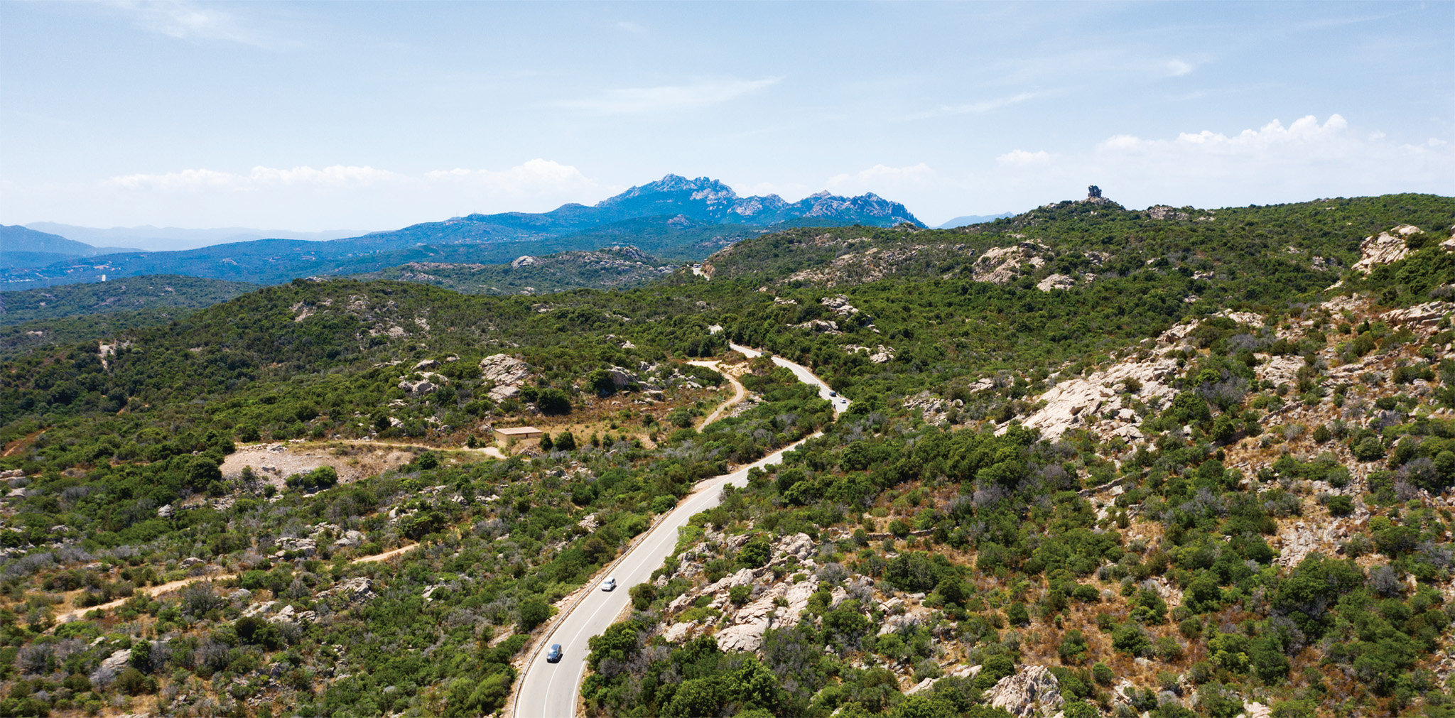 Twisting around mountain tops skirting along stunning coastline and weaving - photo 10