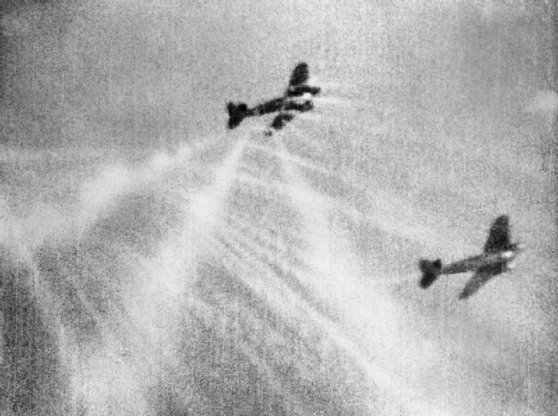 A picture of a Royal Air Force plane attacking a Luftwaffe plane during World - photo 1