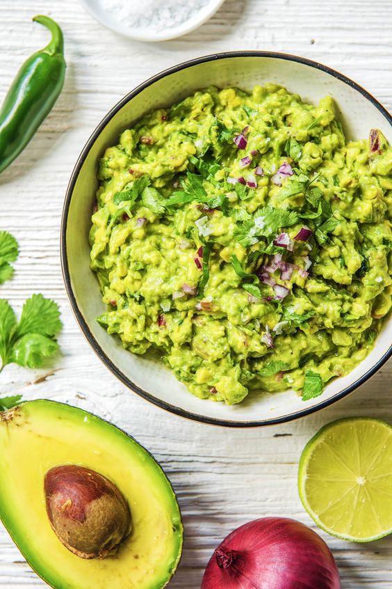 This simple guacamole recipe has a spicy kick when you take a bite of the - photo 13