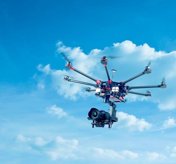 An octocopter flies through the air holding a large camera FACT If one or two - photo 4