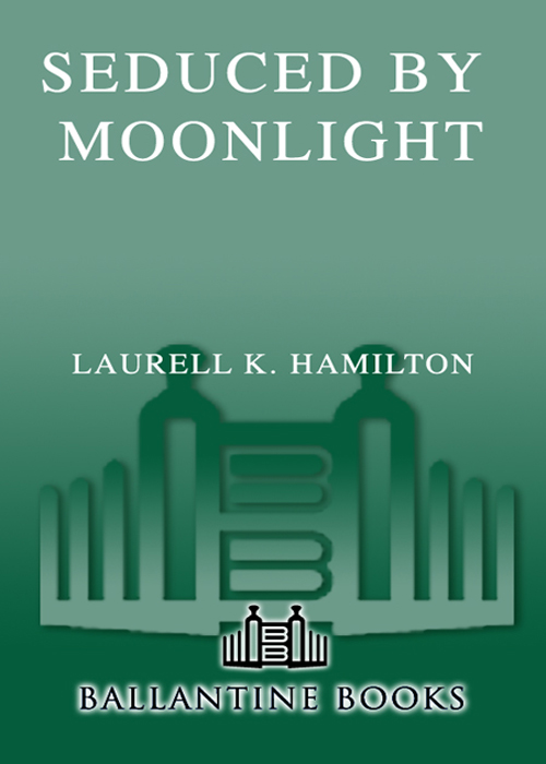 SEDUCED BY MOONLIGHT LAURELL K HAMILTON Ballantine Books New York TABLE - photo 1