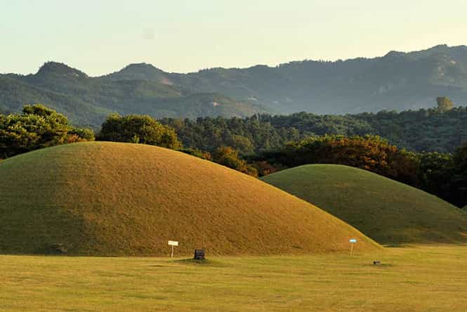 Gyeongju The giant tumuli mounds are just one of the captivating sights in and - photo 6