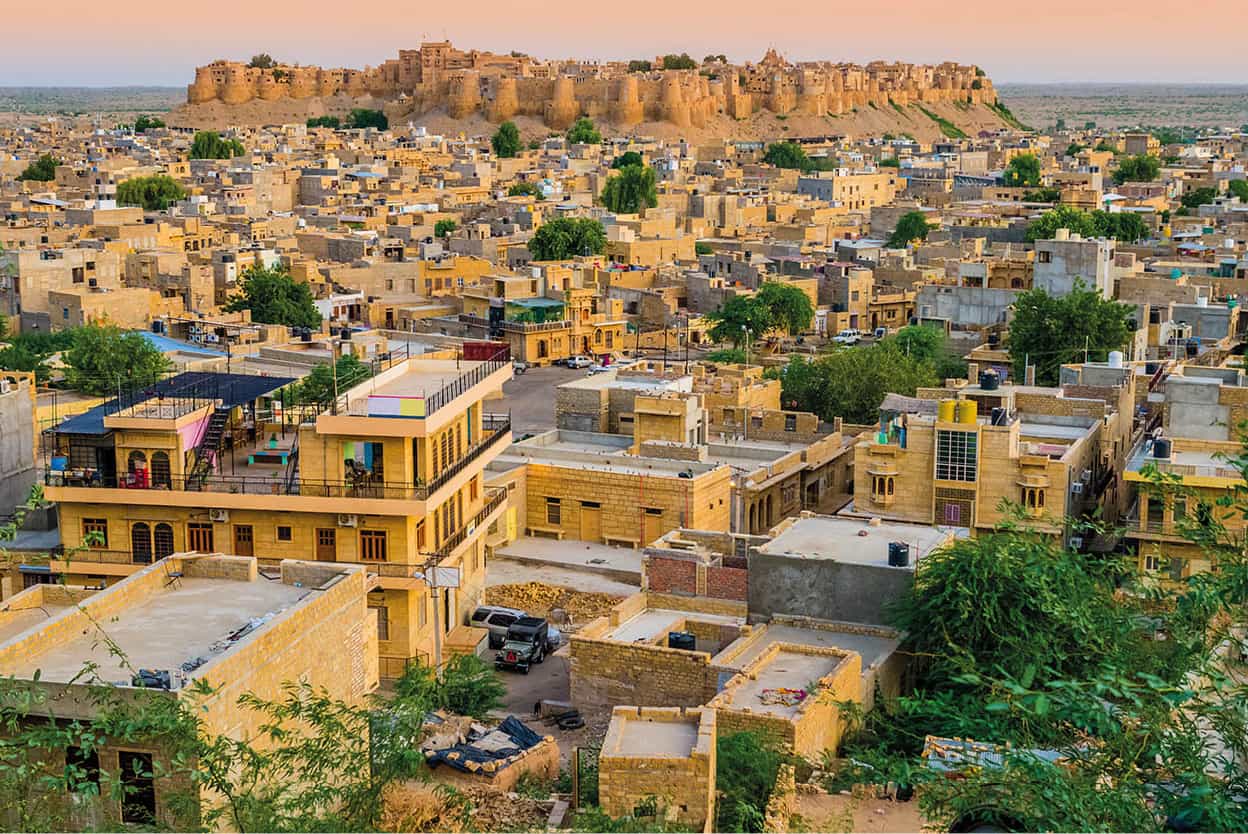 Jaisalmer The desert citadel of Jaisalmer with its golden sandstone fort and - photo 5